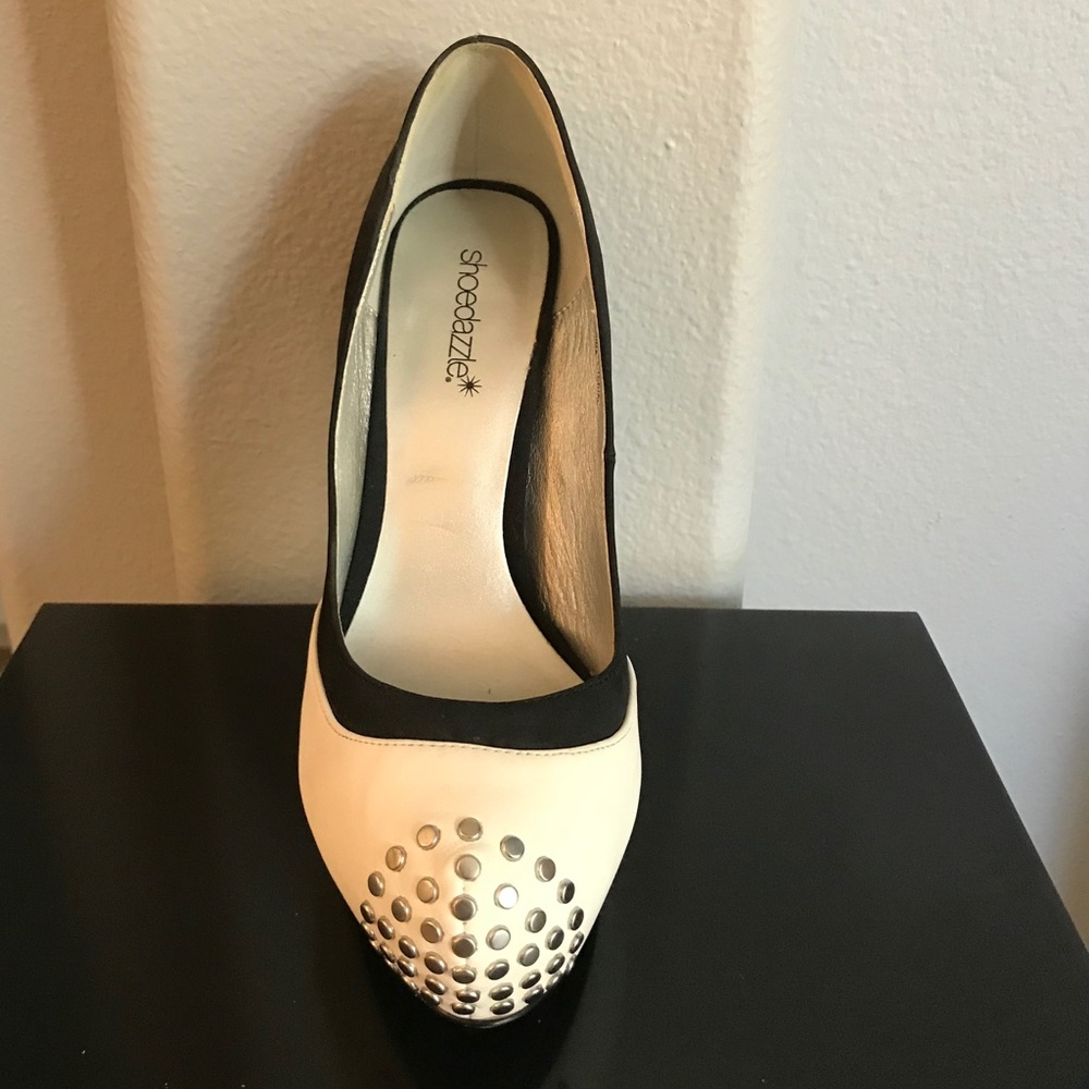 ShoeDazzle cream & black front studded heel